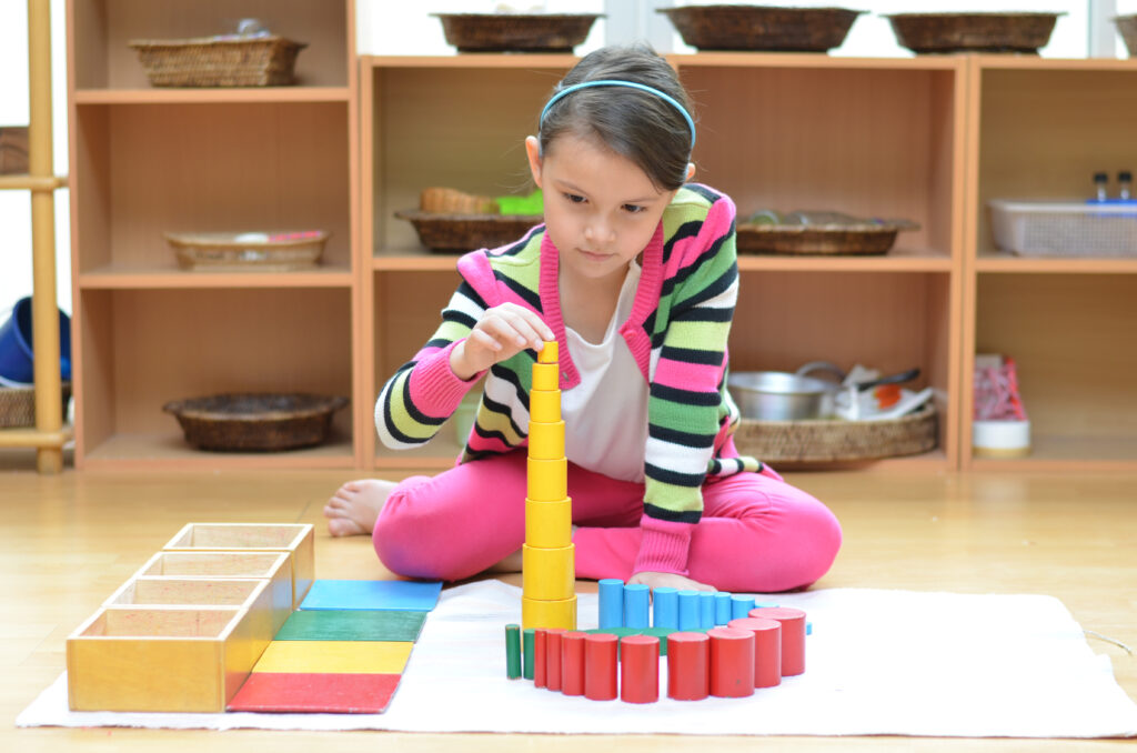 Montessori preschool students in an early childhood classroom